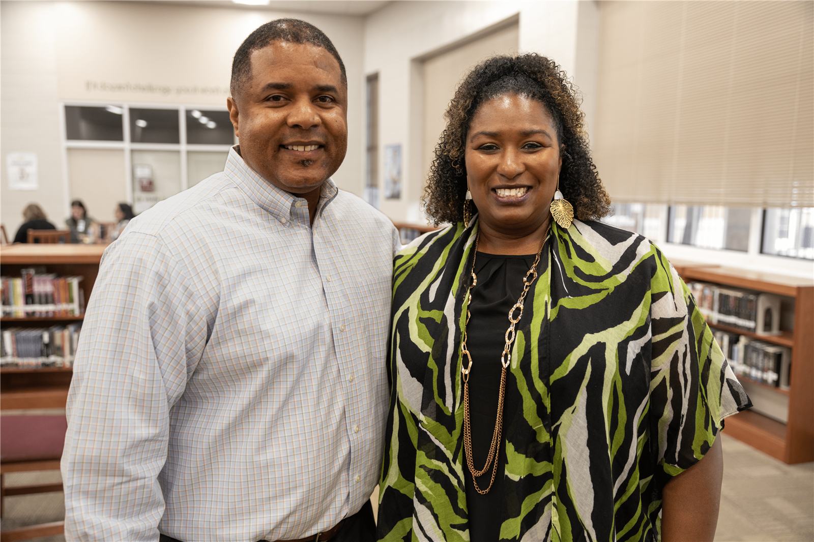 Principal and Vice Principal smiling
